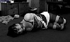 prostitute hogtied nympho tarty hoe sucking skank hogtied in ropes vintage HOM Bondage classics website black and white images of horny tarty hoe sucking women bound and gagged girls tied up and left futile struggles