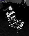hooker in tight inescapable rope bondage tarty sucking street walker tied up in latex catsuit Stalked tied up and left vintage HOM Bondage classics website black and white images of horny women bound and gagged skank girls tied up in ropes