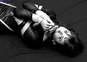 hot nympho teen goth lesbian in tight rope bondage latex catsuit self bondage orgasm Stalked tied up and left vintage HOM Bondage classics website black and white images of horny women bound and gagged