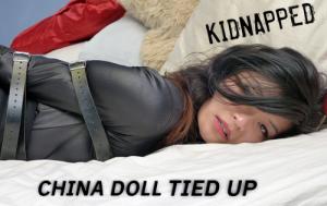 www.trussedup.com - escort call girls tied up thigh high boots leather body body harness bondage thumbnail