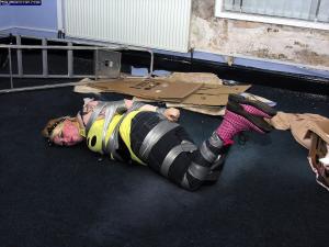 www.trussedup.com - goth girl tied up gagged in a pervs basement hostage thumbnail